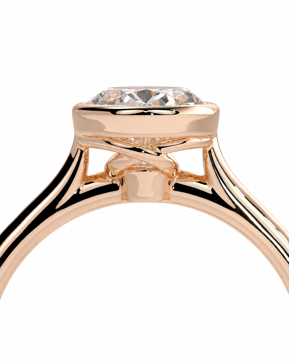 color_10K_RG, color_14K_RG &&Close-up of a rose gold ring with a clear round-cut gemstone in a prong setting, shown against a plain white background.