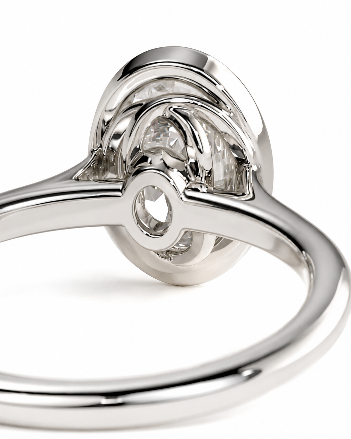 color_925_SIL,color_935_ARG,color_10K_WG, color_14K_WG &&Close-up of a polished silver ring featuring a round clear gemstone in a complex prong setting, with a small heart-shaped cutout detail on the band, set against a clean white background.