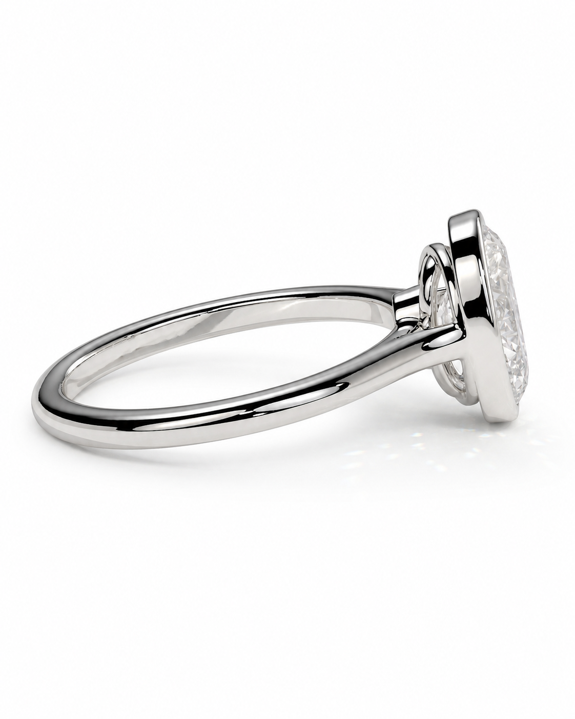 color_925_SIL,color_935_ARG,color_10K_WG, color_14K_WG &&A silver-toned diamond ring with a round brilliant-cut diamond set in a four-prong setting, shown from a side angle on a clean white background.