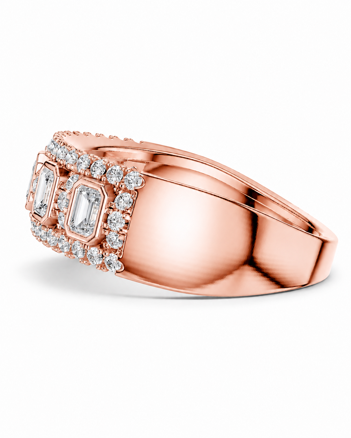 color_10K_RG, color_14K_RG &&	
A rose gold ring with a wide band and a rectangular cluster of clear baguette and round-cut gemstones, shown on a clean white background.