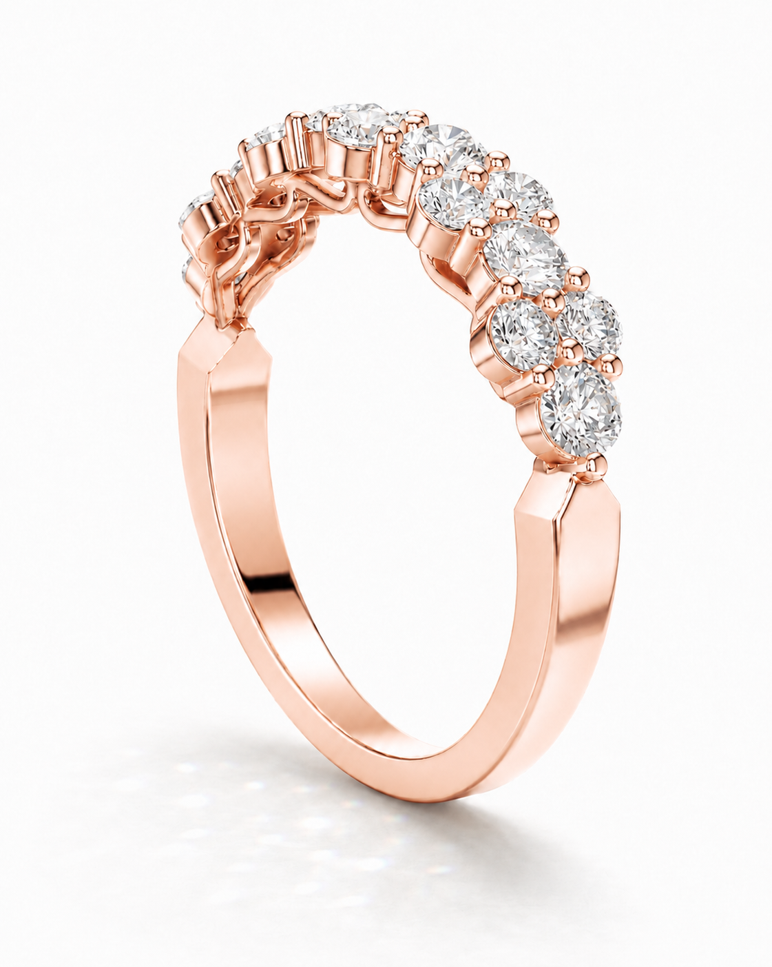 color_10K_RG, color_14K_RG &&	
A rose gold eternity ring featuring a curved row of round-cut clear gemstones in a prong setting, shown on a clean white background.