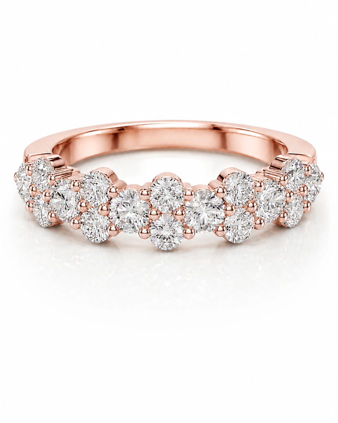 color_10K_RG, color_14K_RG &&	
A rose gold eternity ring featuring a continuous row of round brilliant-cut diamonds in a prong setting, shown on a clean white background.
