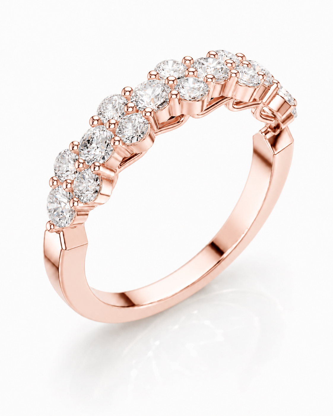color_10K_RG, color_14K_RG &&	
A rose gold eternity ring featuring a row of round-cut clear gemstones in a prong setting, shown on a clean white background with a soft reflection.