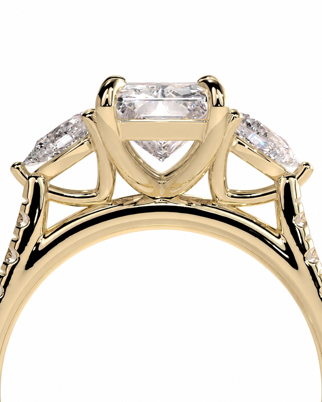 color_10K_YG, color_14K_YG &&A close-up of a yellow gold ring featuring a rectangular center diamond and two marquise-cut side diamonds, set against a plain white background.