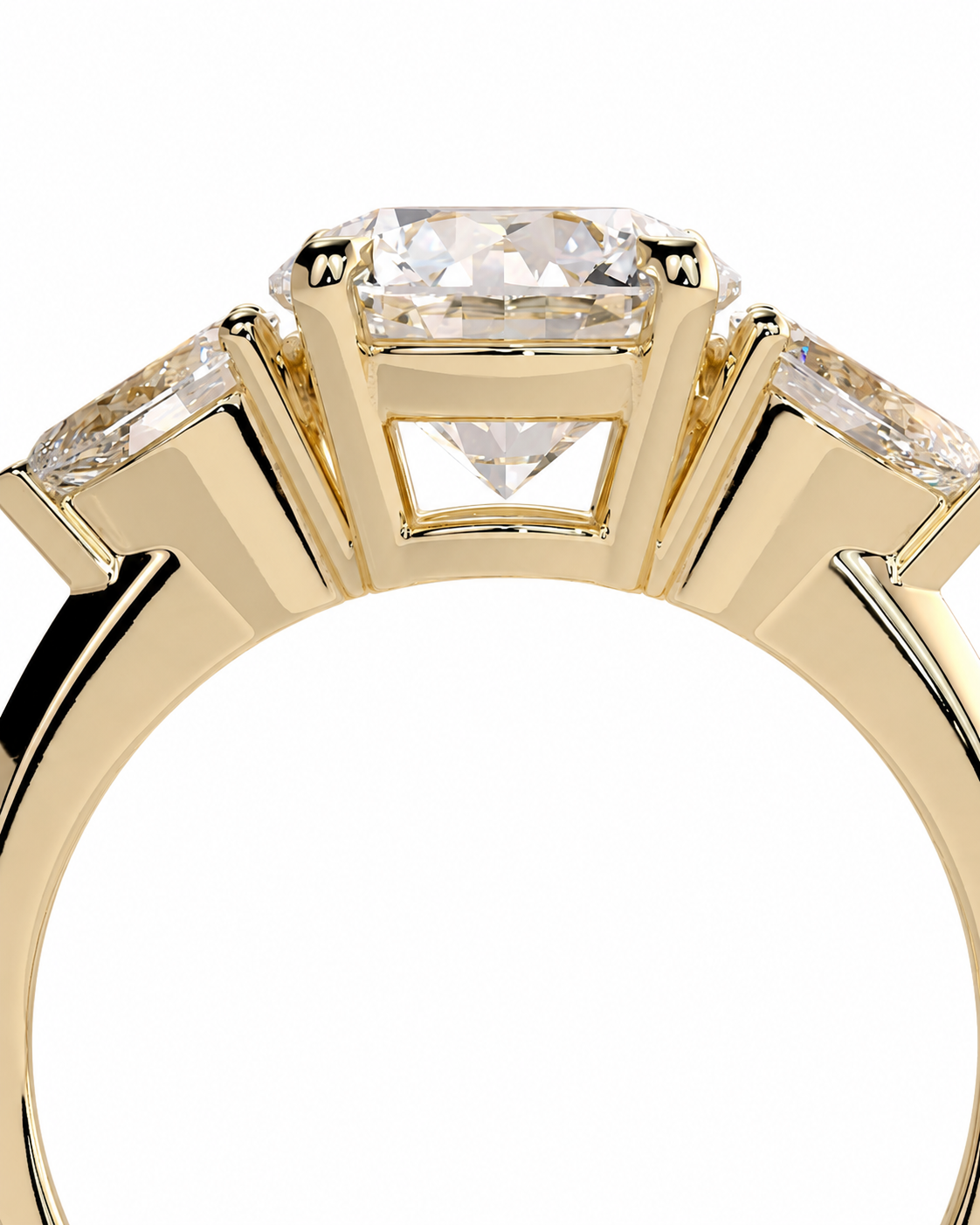color_10K_YG, color_14K_YG &&A close-up of a yellow gold ring featuring a central rectangular diamond with two smaller diamonds on either side, set in a polished gold band against a white background.