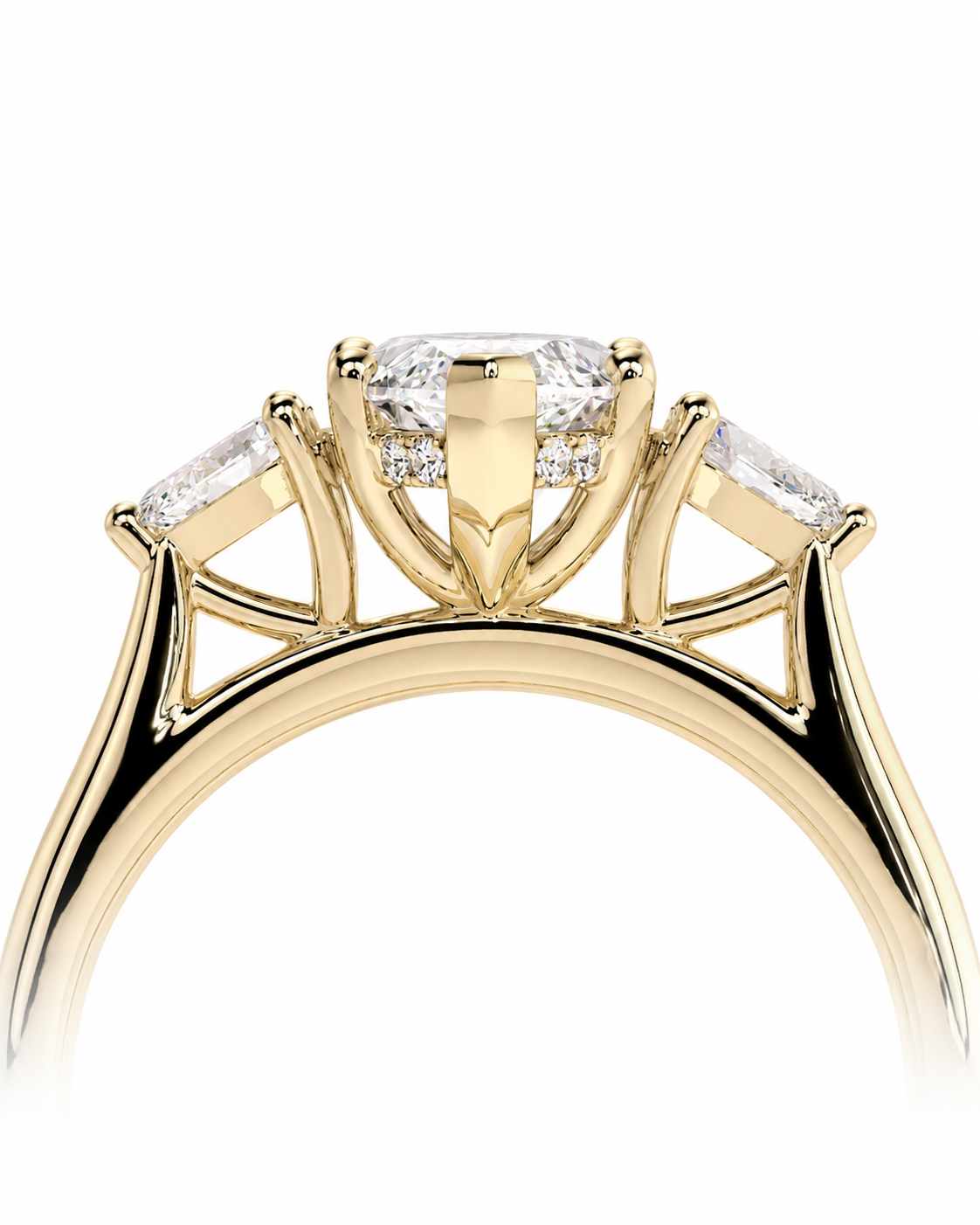 color_10K_YG, color_14K_YG &&A close-up of a yellow gold ring featuring a central cushion-cut diamond surrounded by a halo, with two baguette-cut diamonds on either side, set against a plain white background.