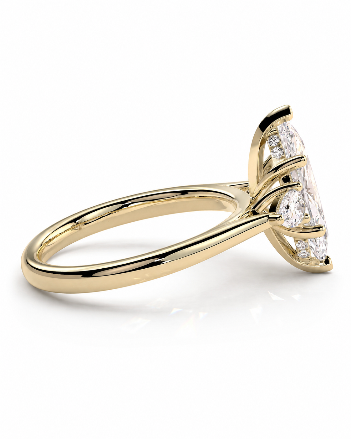 color_10K_YG, color_14K_YG &&A yellow gold ring with a marquise-cut diamond center stone and smaller diamonds along the shoulders, shown on a clean white background.
