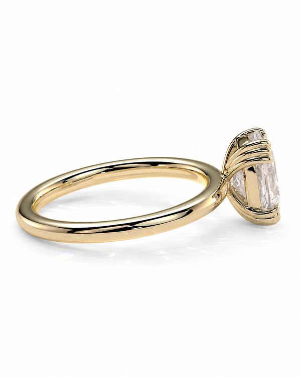 color_10K_YG, color_14K_YG &&A yellow gold ring with a bezel-set clear gemstone, shown from a side profile view on a clean white background.