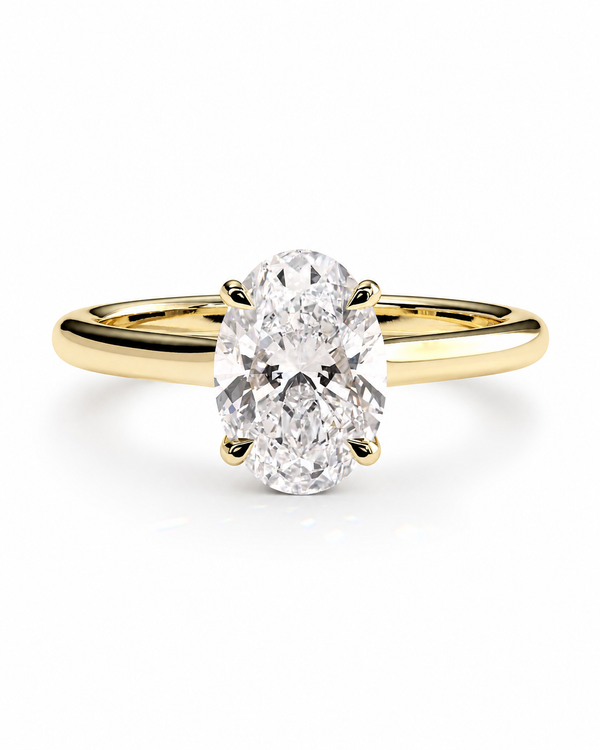 color_10K_YG, color_14K_YG &&An oval-cut diamond solitaire ring set in a yellow gold band, shown on a clean white background.