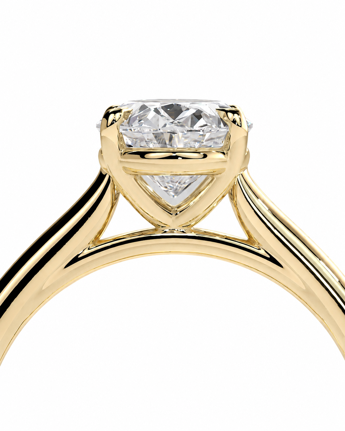 color_10K_YG, color_14K_YG &&A close-up of a yellow gold diamond ring with a triangular-cut center stone in a four-prong setting, shown against a plain white background.