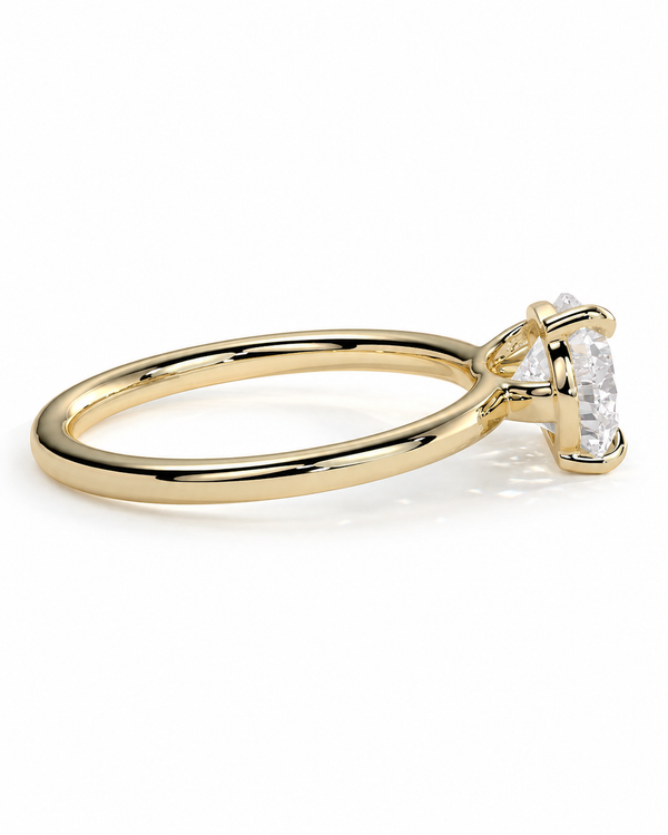color_10K_YG, color_14K_YG &&
A yellow gold solitaire engagement ring with a round brilliant-cut diamond, shown in a side profile view on a clean white background.