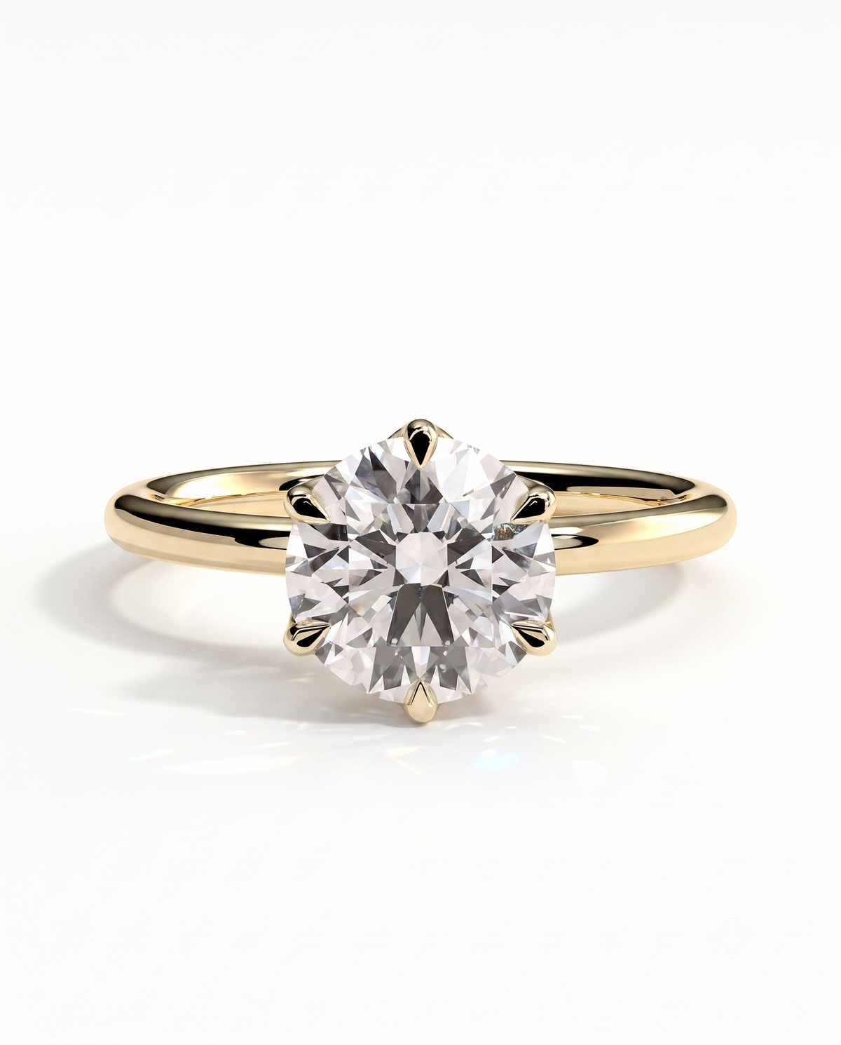 color_10K_YG, color_14K_YG &&A classic solitaire engagement ring featuring a round brilliant-cut diamond set in a yellow gold six-prong band, shown on a clean white background.
