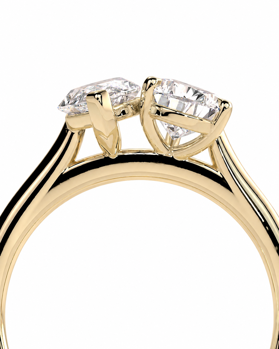 color_10K_YG, color_14K_YG &&A close-up of a yellow gold ring featuring two brilliant-cut clear gemstones in a split setting, shown against a plain white background.