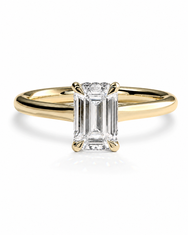 color_10K_YG, color_14K_YG &&A yellow gold engagement ring featuring a large rectangular emerald-cut diamond center stone in a four-prong setting, shown on a clean white background.