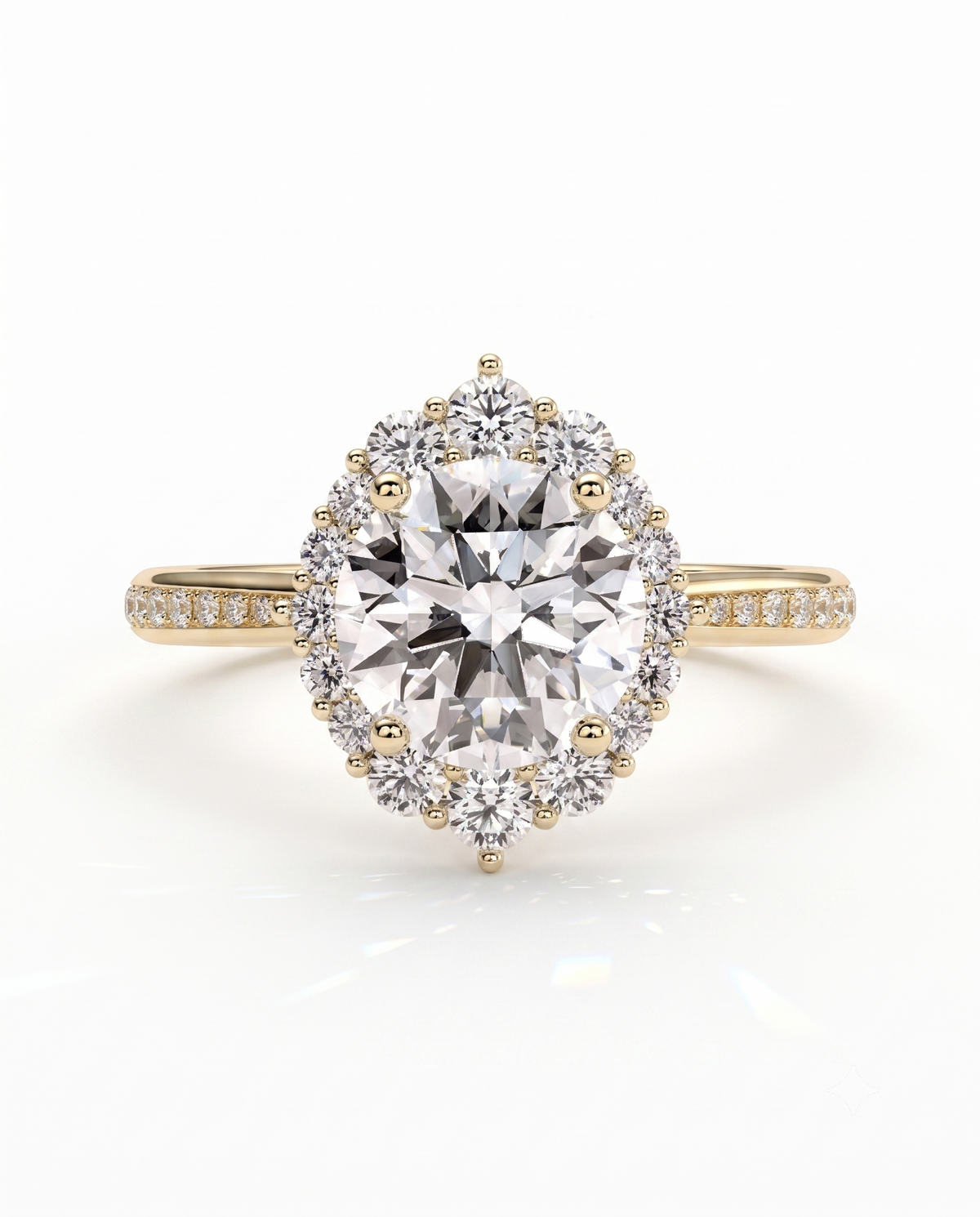 color_10K_YG, color_14K_YG &&A yellow gold halo ring featuring a large oval-cut center diamond surrounded by a double halo of smaller round diamonds, with a shank paved with small round diamonds, shown on a white background.