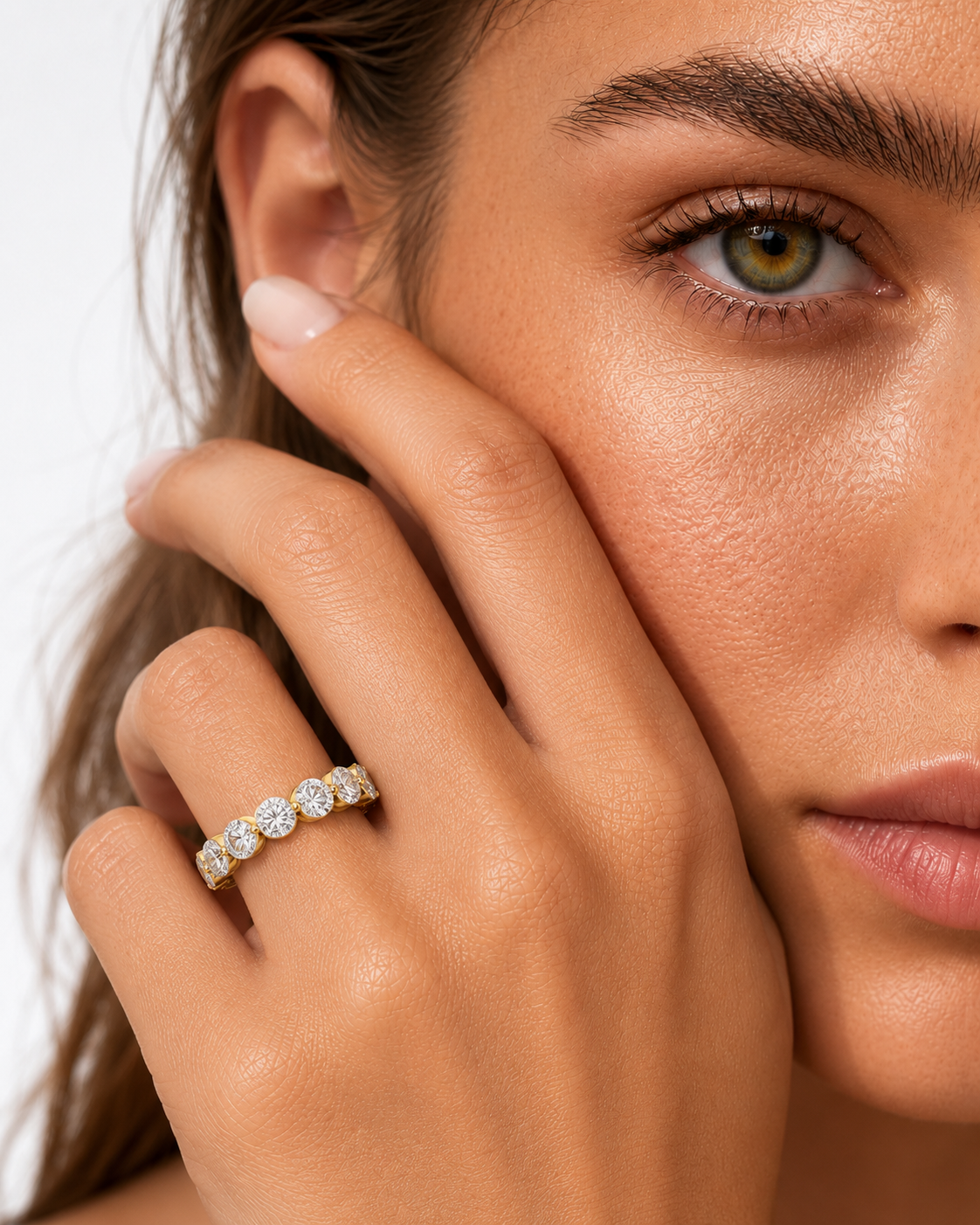 color_10K_YG, color_14K_YG &&Anniversary-style moissanite eternity band with bezel-set round stones and refined craftsmanship.