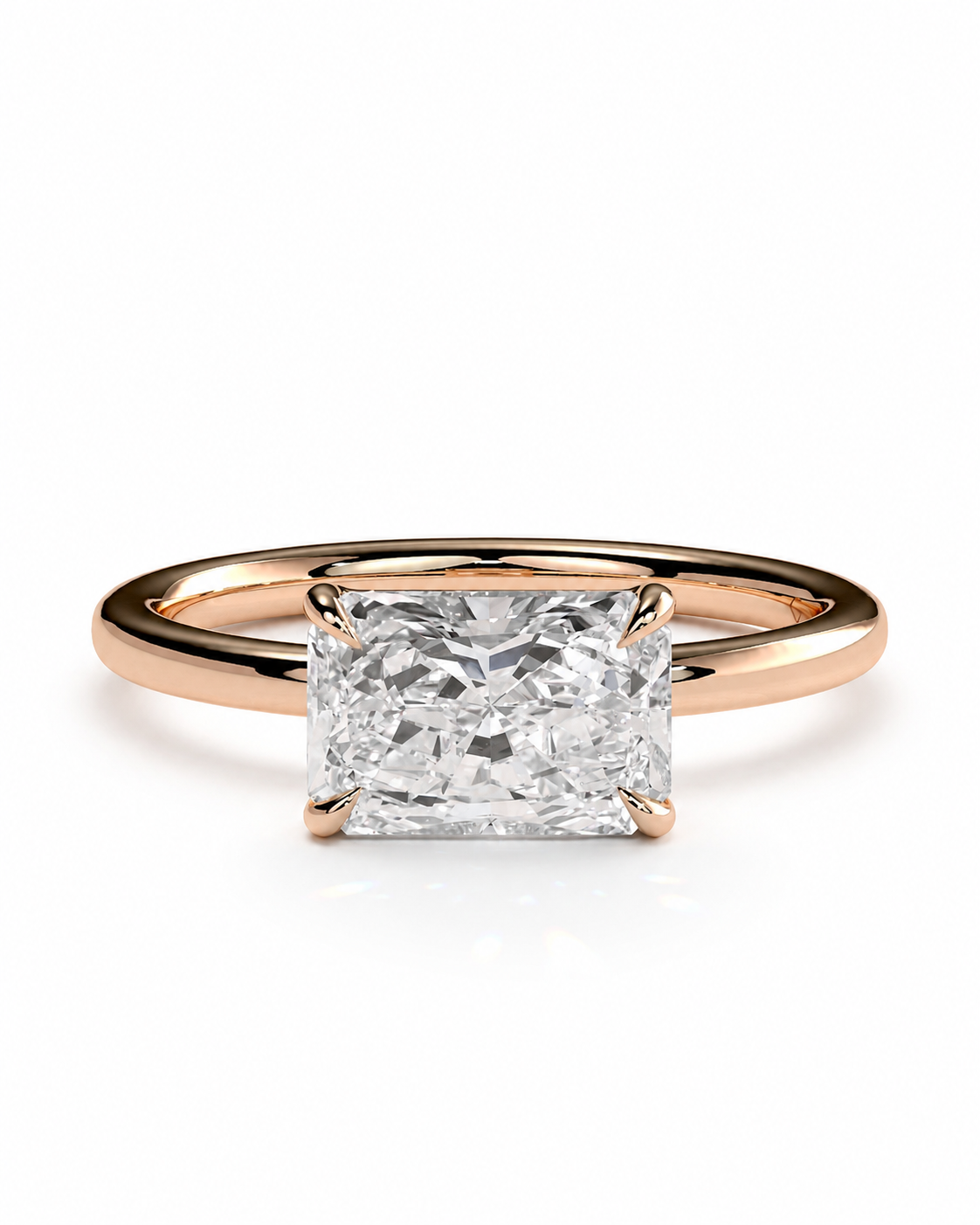 color_10K_RG, color_14K_RG &&
A rose gold engagement ring featuring a large rectangular princess-cut diamond center stone, set in a four-prong setting on a polished band, shown against a plain white background.