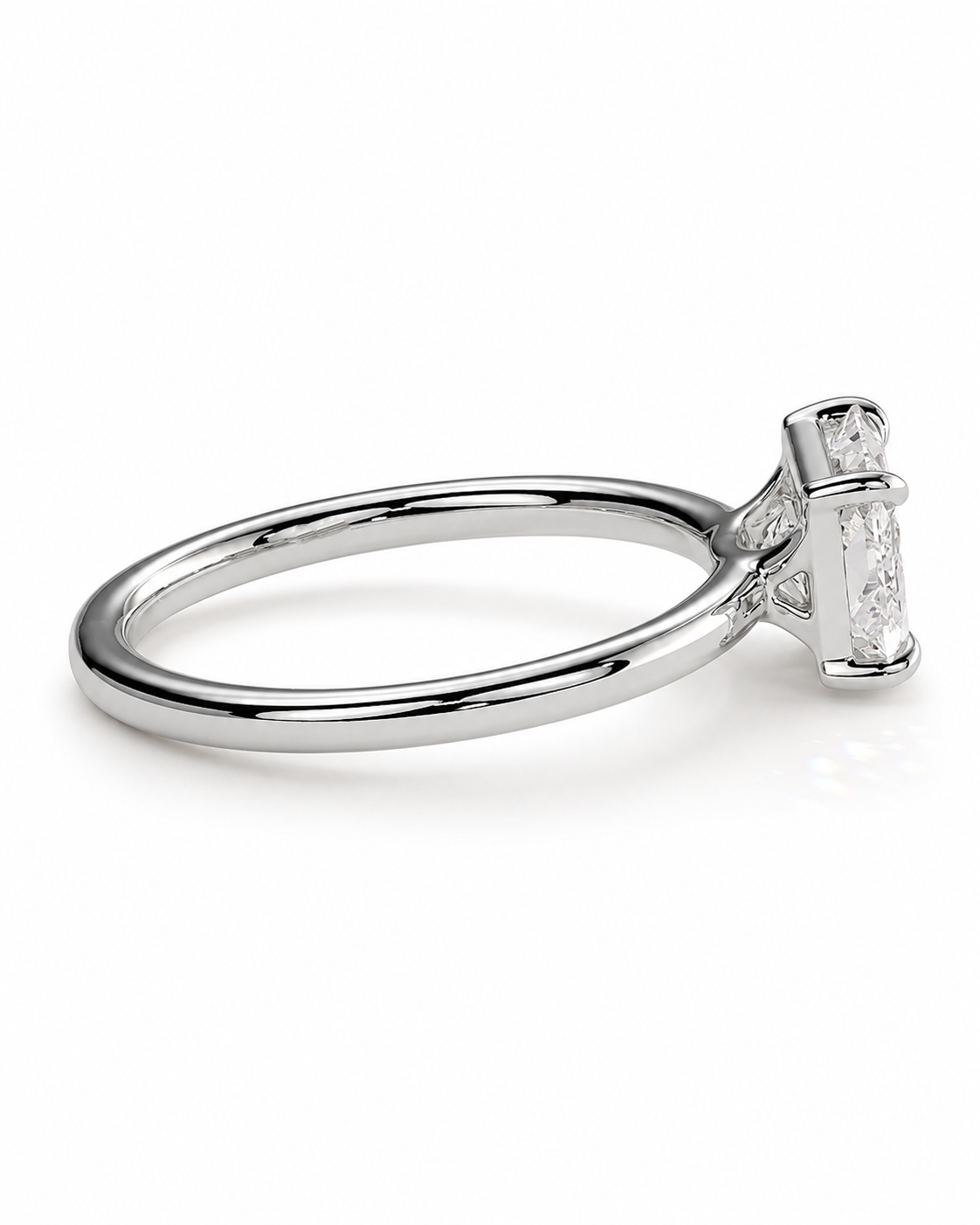 color_925_SIL,color_935_ARG,color_10K_WG, color_14K_WG &&
A polished silver-tone ring featuring a rectangular baguette-cut clear gemstone in a prong setting, shown on a clean white background.