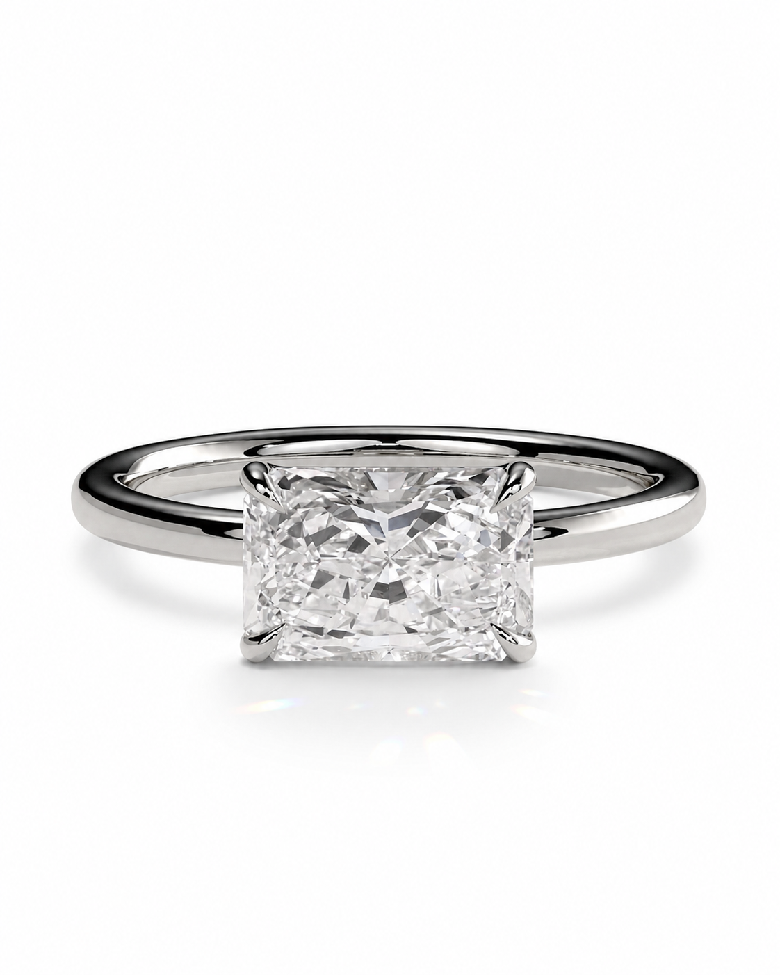 color_925_SIL,color_935_ARG,color_10K_WG, color_14K_WG &&
An engagement ring featuring a rectangular princess-cut diamond set in a polished silver-colored band, shown against a clean white background.