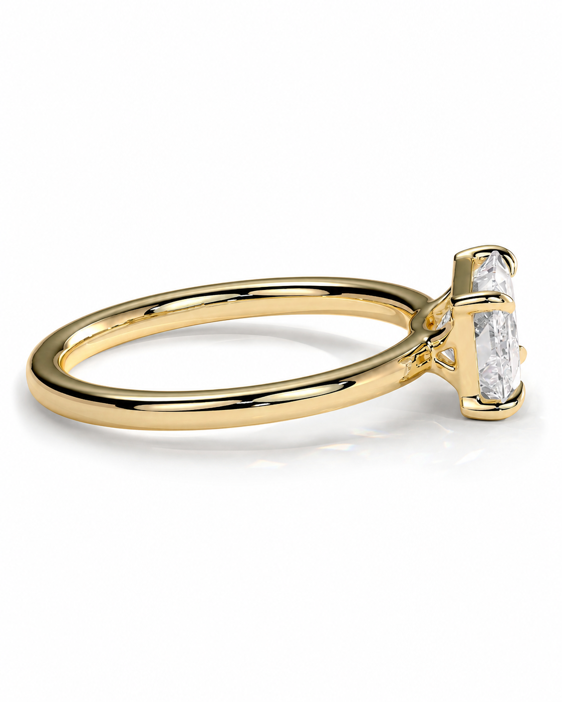 color_10K_YG, color_14K_YG &&
A yellow gold solitaire engagement ring featuring a large rectangular baguette-cut clear center stone in a four-prong setting, shown on a clean white background.