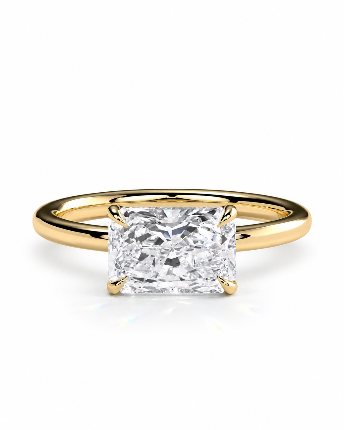 color_10K_YG, color_14K_YG &&
A classic yellow gold solitaire ring featuring a large rectangular princess-cut diamond center stone, shown on a clean white background.