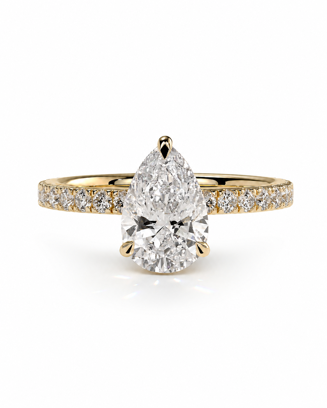 color_10K_YG, color_14K_YG &&A pear-cut diamond engagement ring in yellow gold with a pavé band, set against a clean white background.