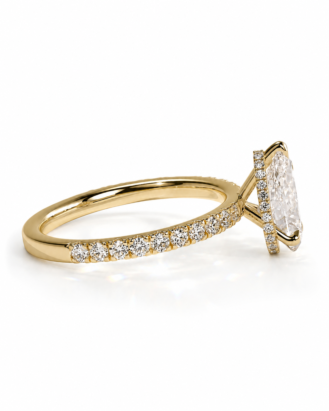 color_10K_YG, color_14K_YG &&A yellow gold ring featuring a large cushion-cut clear center stone and a pavé band set with small round diamonds, shown on a clean white background.