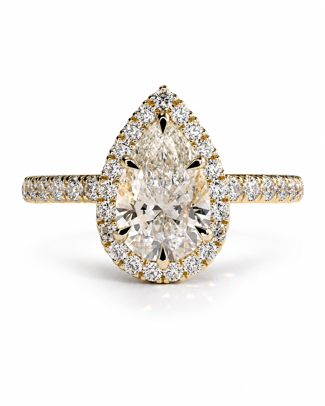 color_10K_YG, color_14K_YG &&A pear-cut diamond engagement ring in yellow gold with a double halo setting and a pavé diamond band, shown on a clean white background.