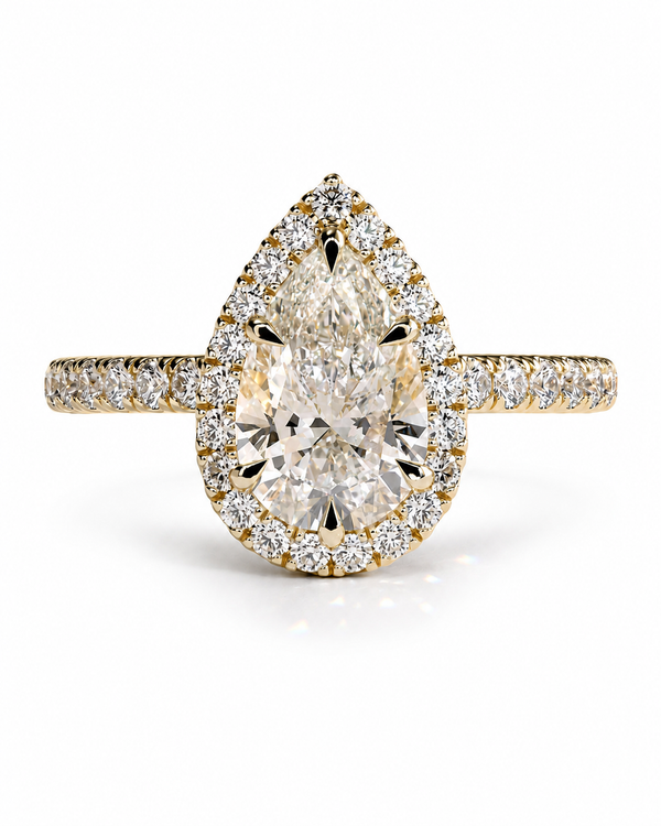 color_10K_YG, color_14K_YG &&A pear-cut diamond engagement ring in yellow gold with a double halo setting and a pavé diamond band, shown on a clean white background.