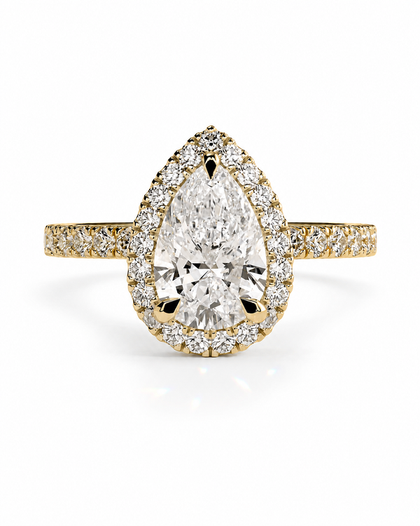 color_10K_YG, color_14K_YG &&A pear-cut diamond halo ring in yellow gold, featuring a large central diamond surrounded by a halo of smaller diamonds, with the band also paved with diamonds, set against a clean white background.