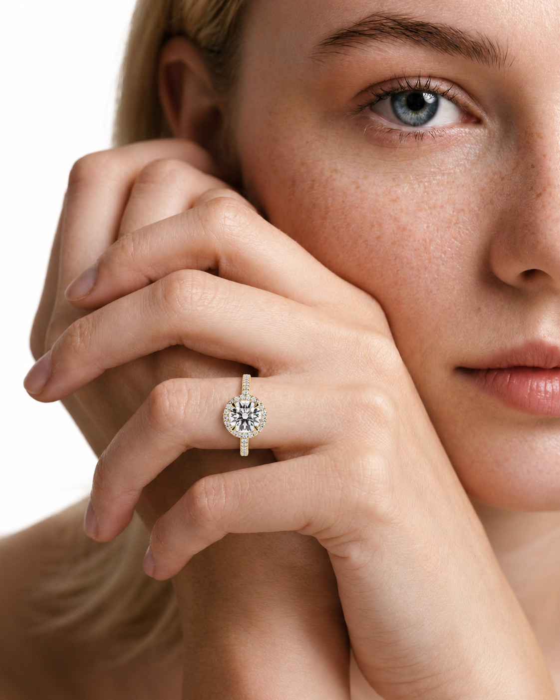color_10K_YG, color_14K_YG &&A close-up lifestyle shot of a model wearing a silver-toned ring with a central cluster of clear gemstones, set against a clean white background.