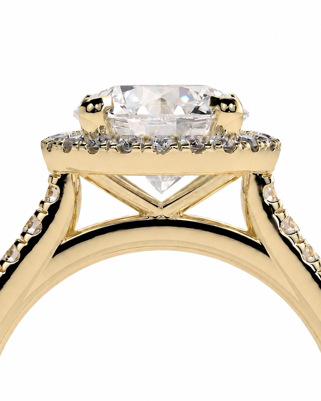 color_10K_YG, color_14K_YG &&A close-up of a yellow gold solitaire engagement ring featuring a large rectangular clear gemstone in a prong setting, surrounded by a halo of small accent stones on a white background.