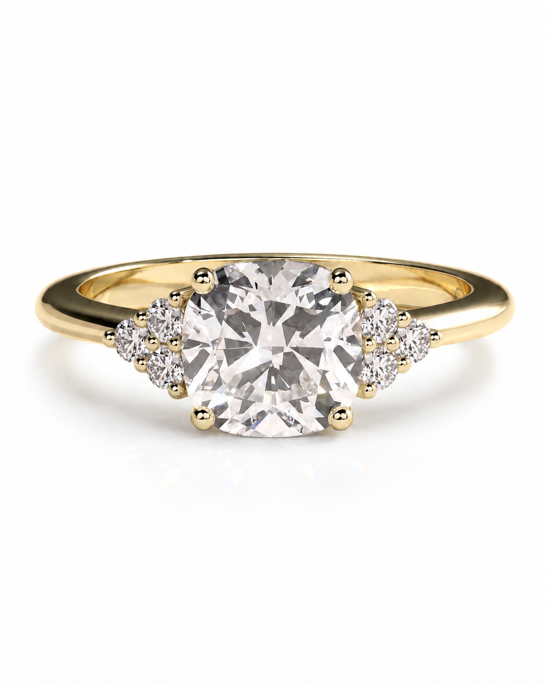 color_10K_YG, color_14K_YG &&A yellow gold ring featuring a large cushion-cut center diamond flanked by small round diamonds on the shoulders, set against a clean white background.
