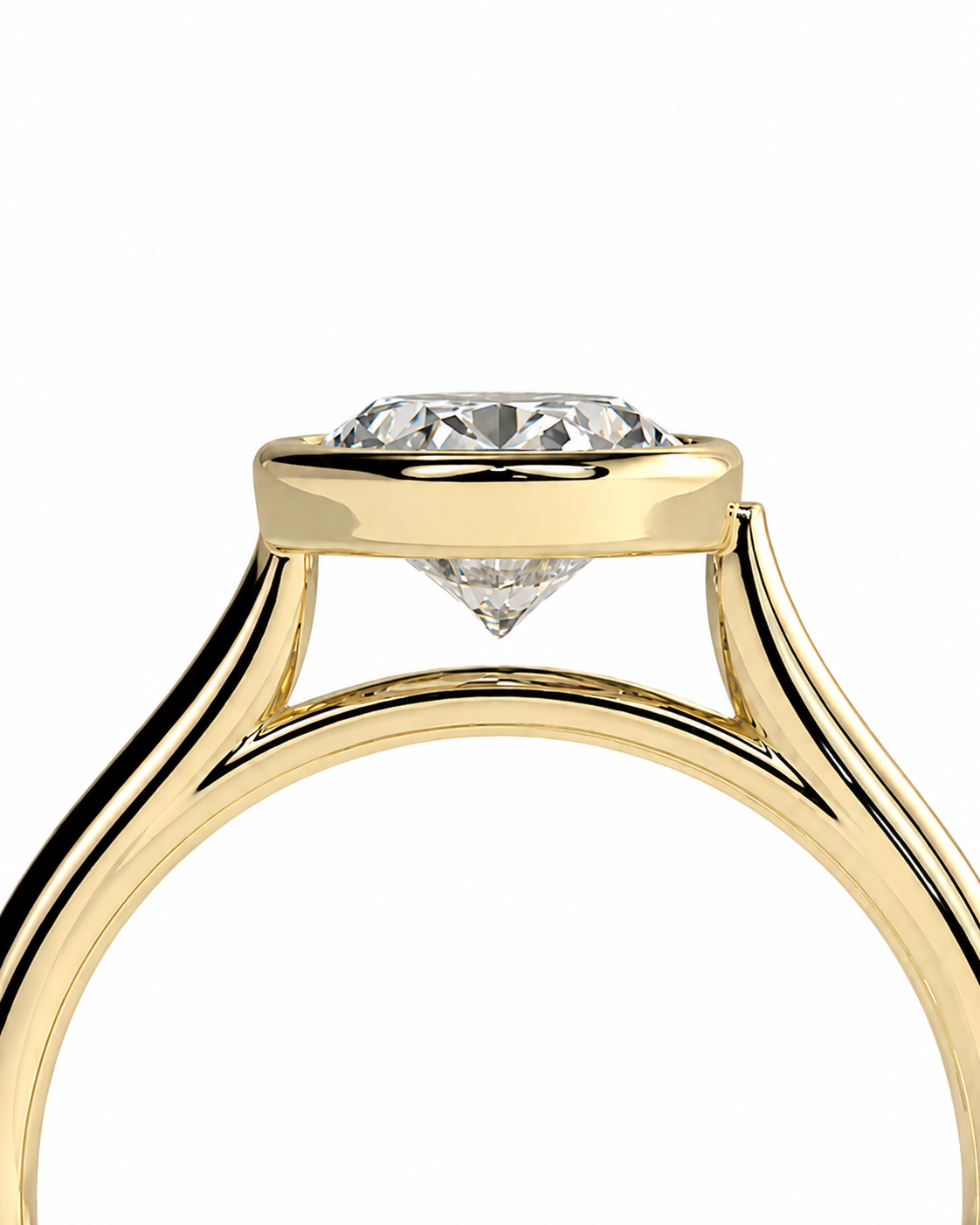 color_10K_YG, color_14K_YG &&Close-up of a yellow gold ring setting with a clear round gemstone and a smaller clear diamond hanging below, shown on a plain white background.