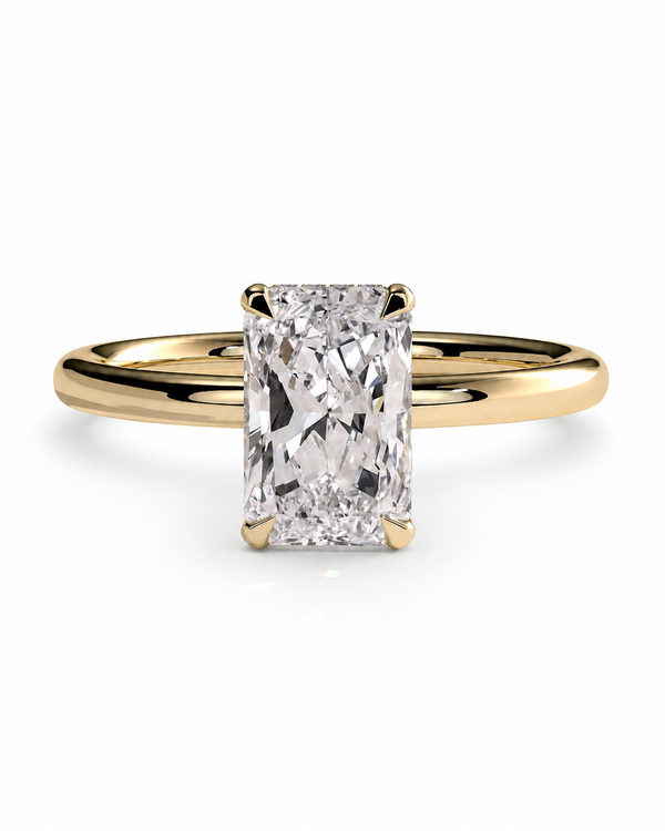 color_10K_YG, color_14K_YG &&A yellow gold engagement ring featuring a rectangular radiant-cut diamond center stone in a four-prong setting, shown on a clean white background.