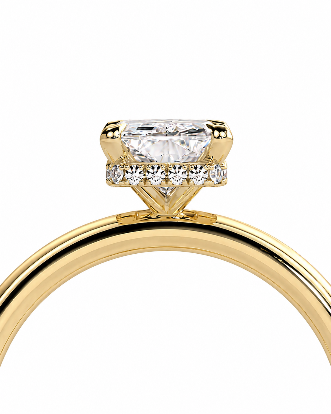 color_10K_YG, color_14K_YG &&A close-up of a yellow gold solitaire engagement ring featuring a rectangular radiant-cut diamond center stone and smaller diamonds along the band, set against a plain white background.