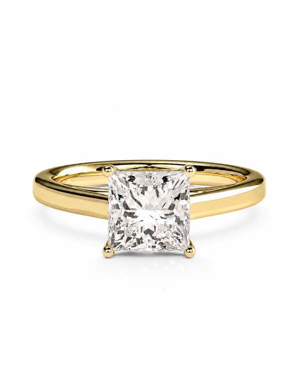 color_10K_YG, color_14K_YG &&A yellow gold solitaire engagement ring featuring a large, brilliant-cut diamond in a four-prong setting, shown on a clean white background.
