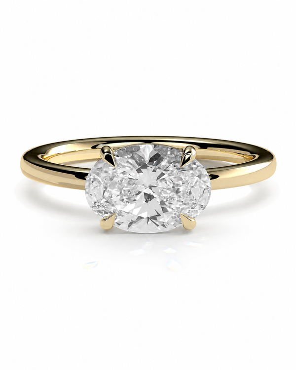 color_10K_YG, color_14K_YG &&An oval-cut diamond engagement ring with a yellow gold band, shown on a clean white background.