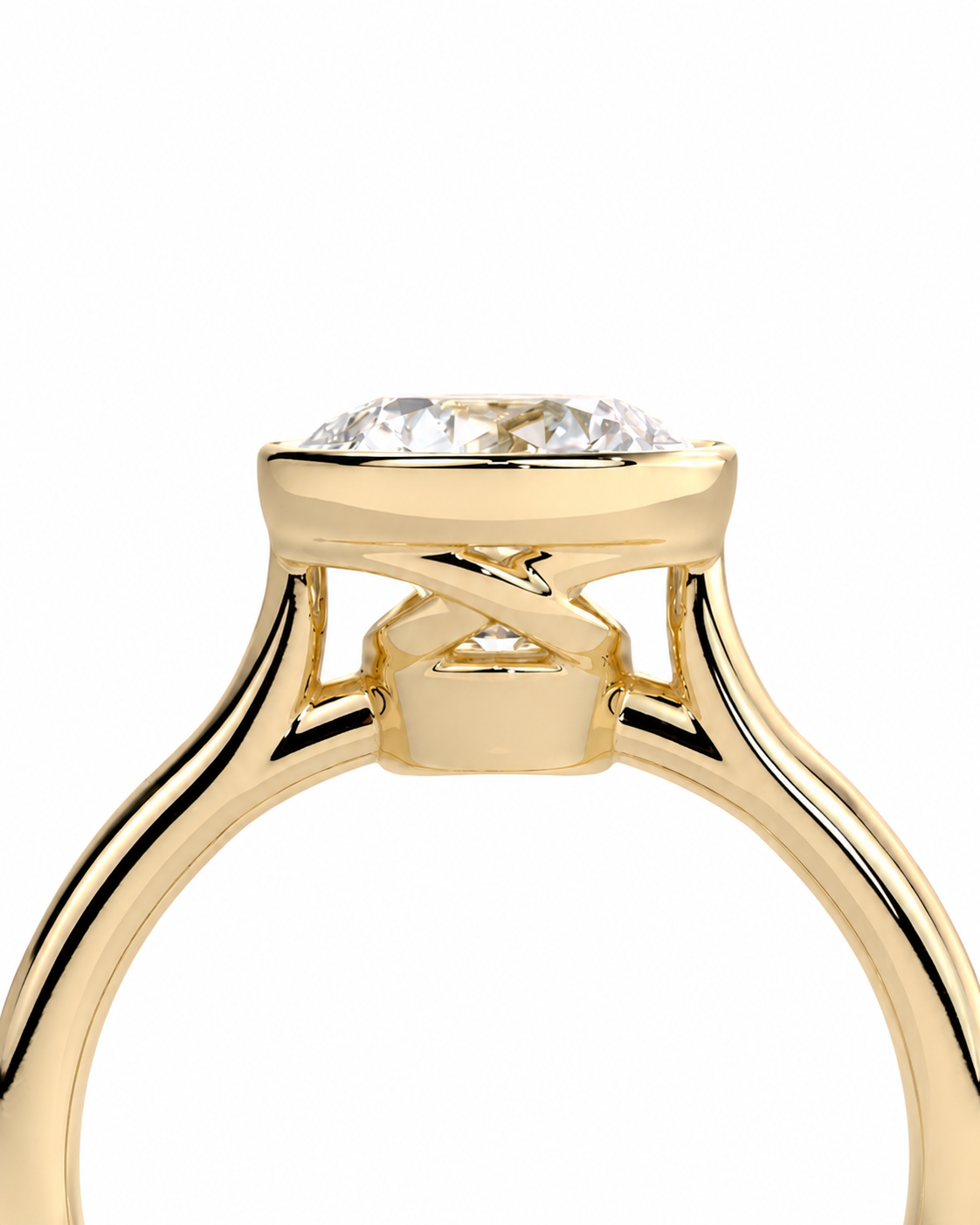color_10K_YG, color_14K_YG &&A close-up of a yellow gold solitaire ring with a clear round-cut gemstone in a prong setting, shown against a plain white background.