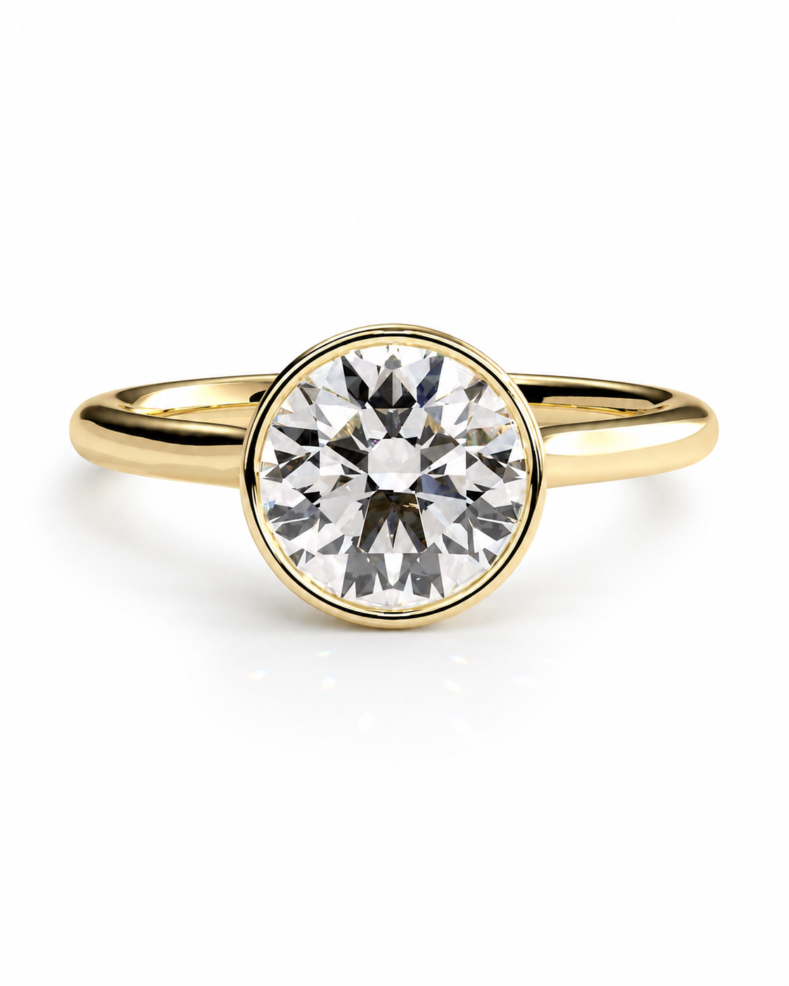 color_10K_YG, color_14K_YG &&A yellow gold solitaire engagement ring featuring a round brilliant-cut diamond set in a bezel setting, shown on a clean white background.