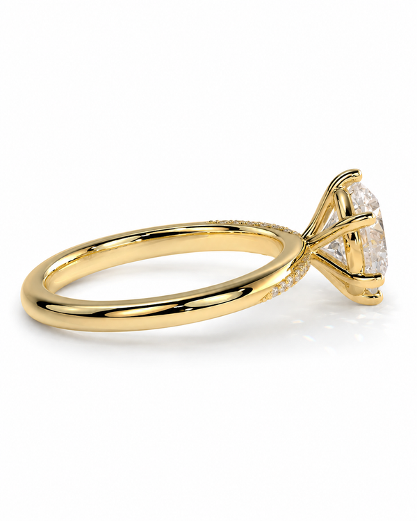 color_10K_YG, color_14K_YG &&A yellow gold solitaire engagement ring with a round brilliant-cut diamond, shown in a three-quarter view on a clean white background.