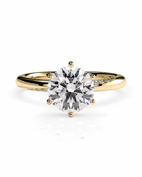 color_10K_YG, color_14K_YG &&A yellow gold solitaire engagement ring with a round brilliant-cut diamond center stone, set against a clean white background.