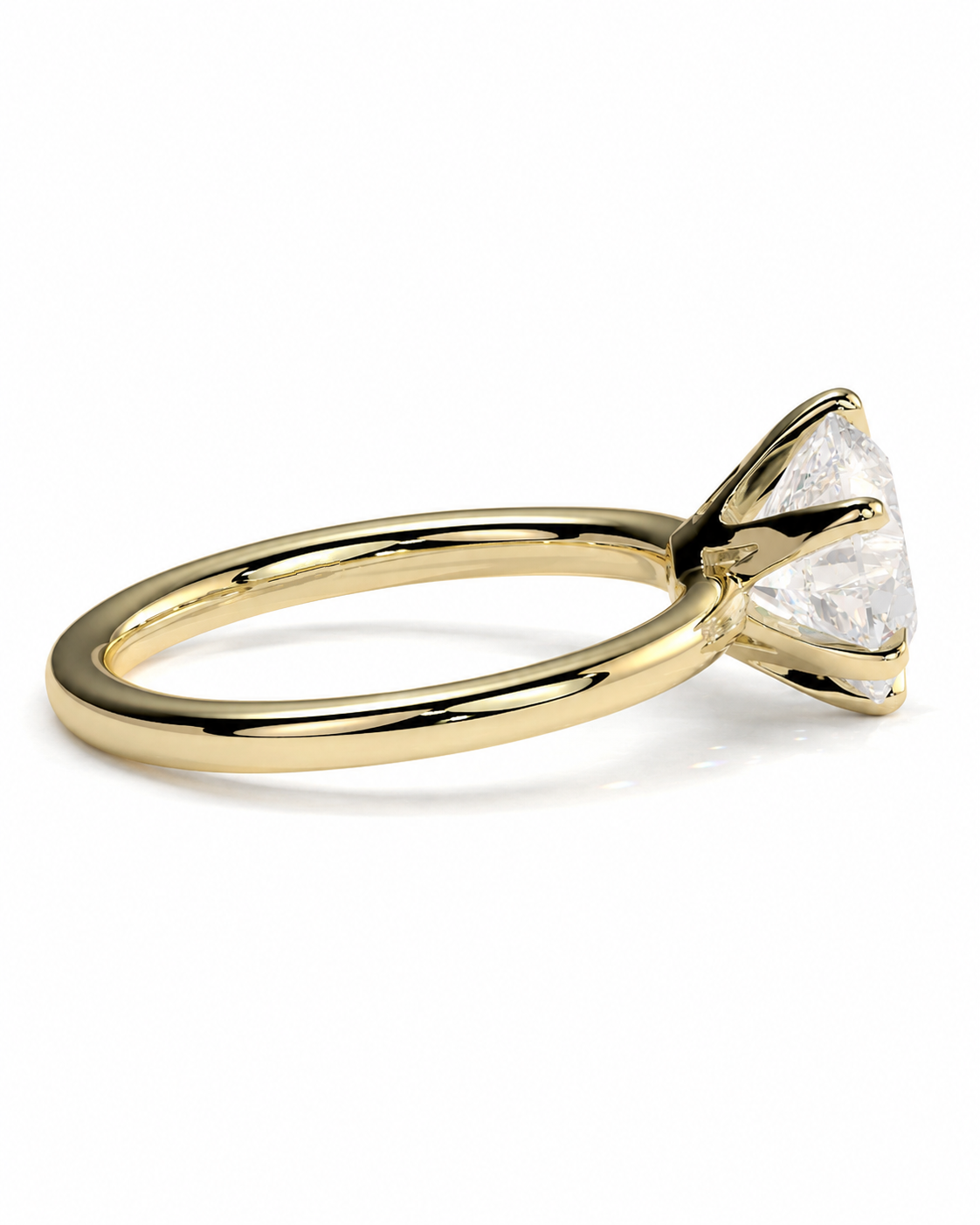 color_10K_YG, color_14K_YG &&A yellow gold solitaire ring featuring a triangular-cut clear gemstone in a prong setting, shown on a clean white background.
