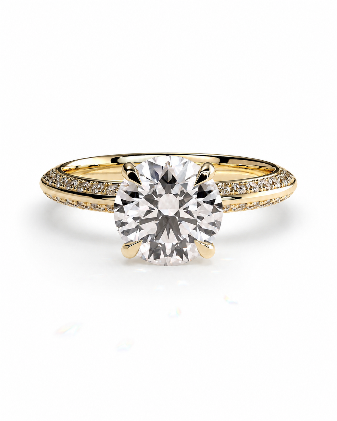 color_10K_YG, color_14K_YG &&A yellow gold solitaire engagement ring featuring a round brilliant-cut diamond center stone and pavé-set diamonds along the shoulders, shown on a clean white background.