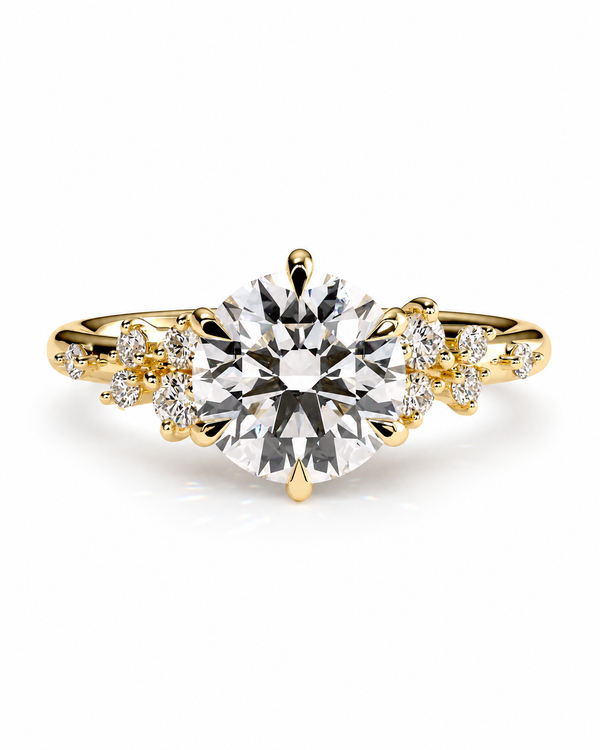 color_10K_YG, color_14K_YG &&yellow gold diamond ring with a large round-cut center stone and smaller diamonds along the shoulders, shown on a clean white background.