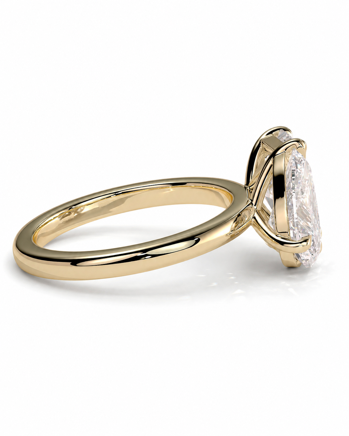 color_10K_YG, color_14K_YG &&A yellow gold solitaire engagement ring with a clear rectangular gemstone, shown in a three-quarter view on a white background.