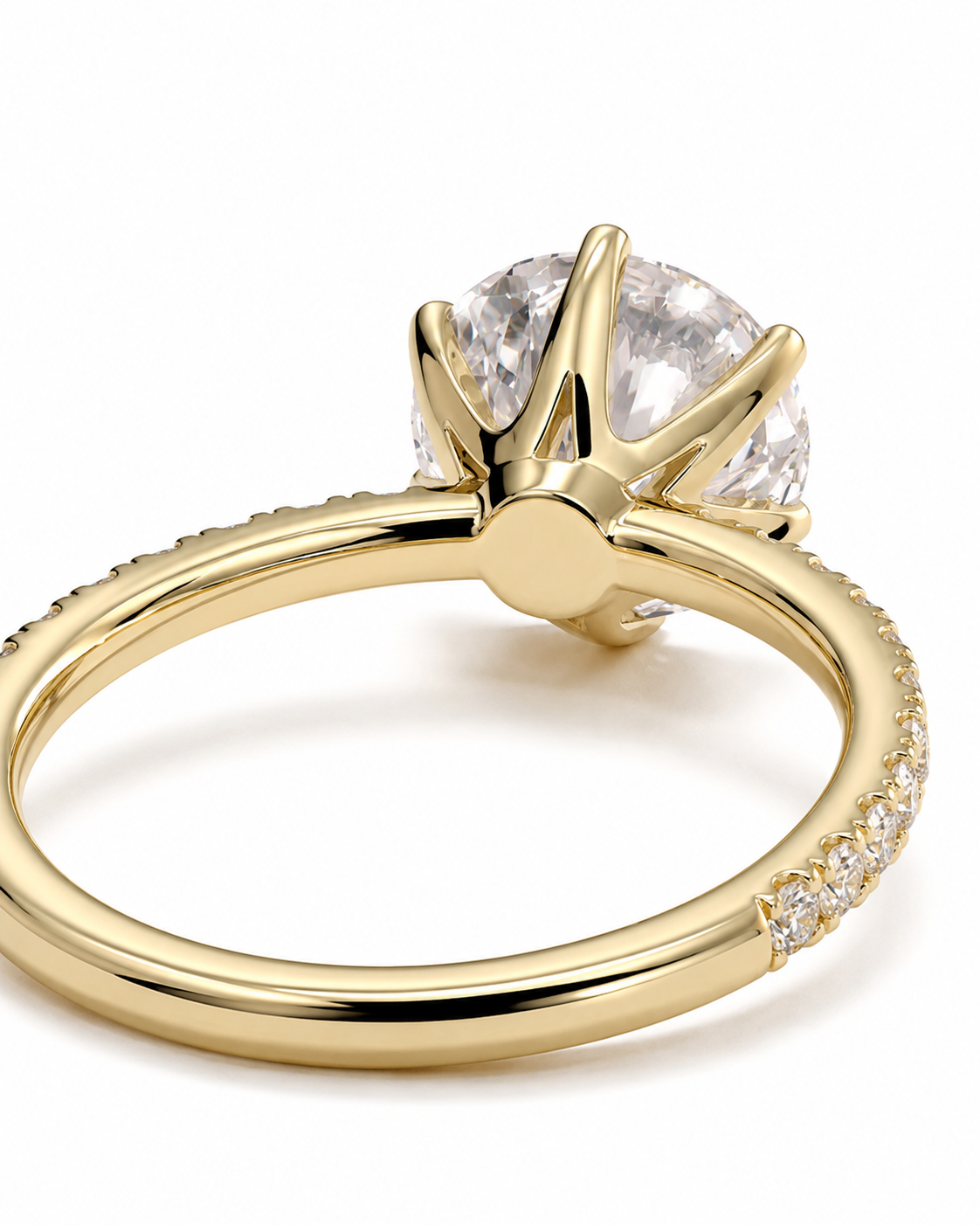 color_10K_YG, color_14K_YG &&A yellow gold solitaire engagement ring with a round brilliant-cut clear center stone in a prong setting, shown on a clean white background.