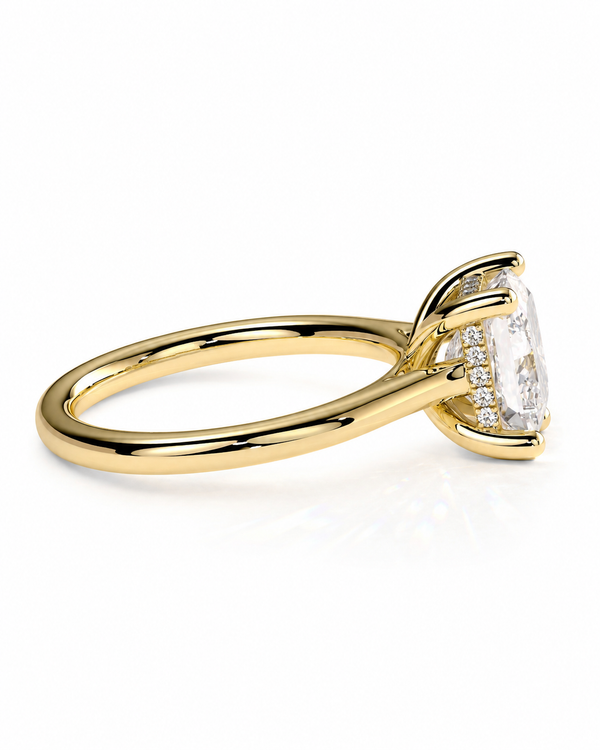 color_10K_YG, color_14K_YG &&A yellow gold diamond ring featuring a large oval-cut center stone and a pavé band with smaller round diamonds, shown on a clean white background.