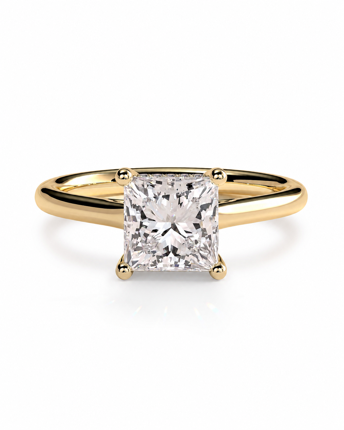 color_10K_YG, color_14K_YG &&A classic yellow gold solitaire engagement ring featuring a large, brilliant-cut princess diamond in a four-prong setting, shown on a clean white background.