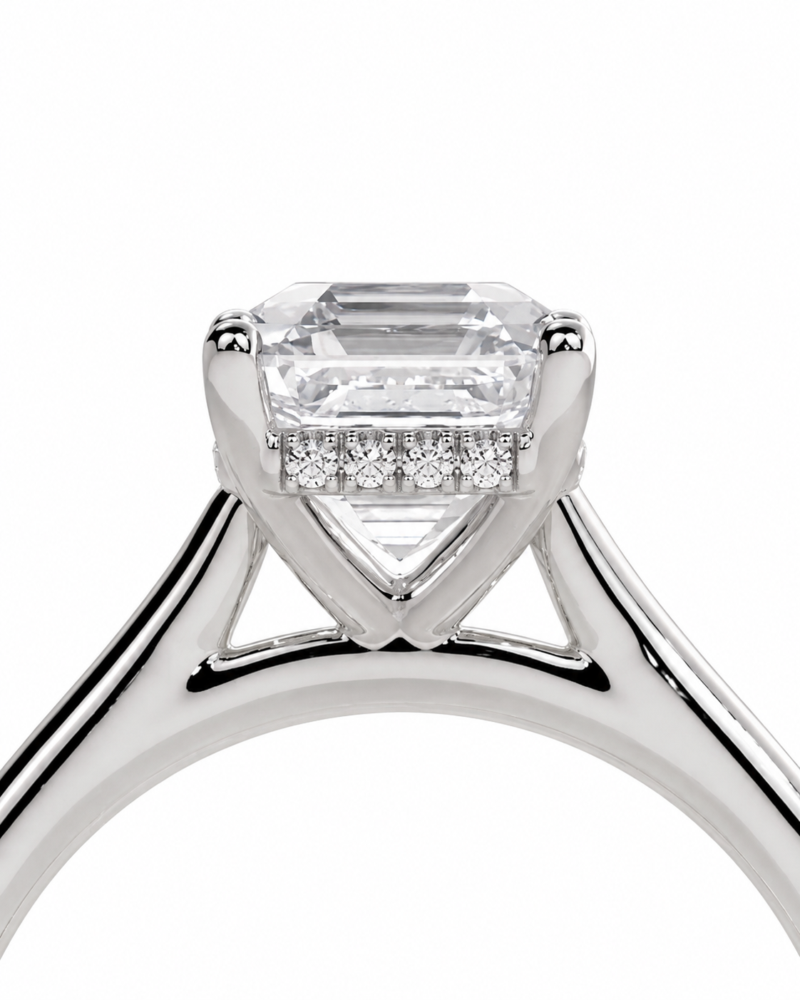 color_925_SIL,color_935_ARG,color_10K_WG, color_14K_WG &&	
A close-up studio shot of a silver-toned diamond ring featuring a large emerald-cut center stone and smaller diamonds along the halo, set against a plain white background.